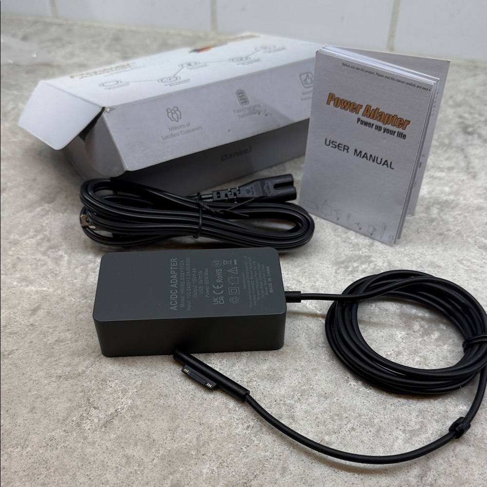Surface Pro Black Power Adapter with Cable box and manual. New opened box.
